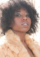 San Jai rocks her natural hair with smokey eyes on location for a photo shoot in Birmingham, Michigan. San Jai-Hair and Makeup Model