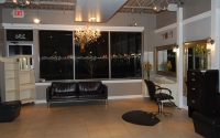 Comfortable waiting area at Beauty Collective Salon in Birmingham, Michigan.