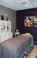 Relaxing, beautiful massage room at the Beauty Collective Salon in Birmingham, Michigan.